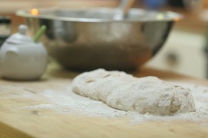 Mix, knead then place in olive oil lined bowl (coating some of the dough too). 