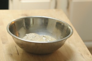 After rising in warm oven stretch and turn dough around then let sit.